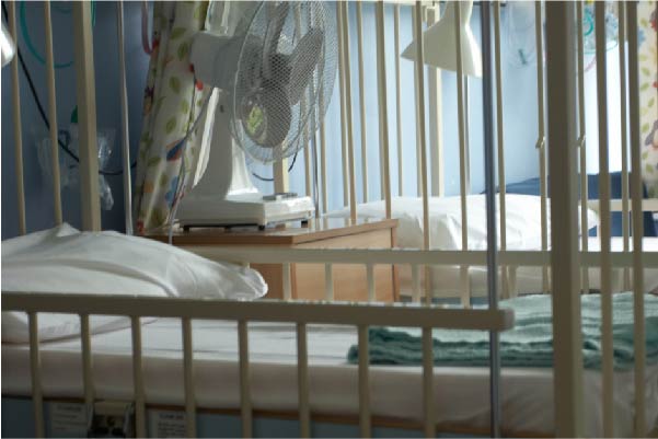 Cot in a children's ward in hospital