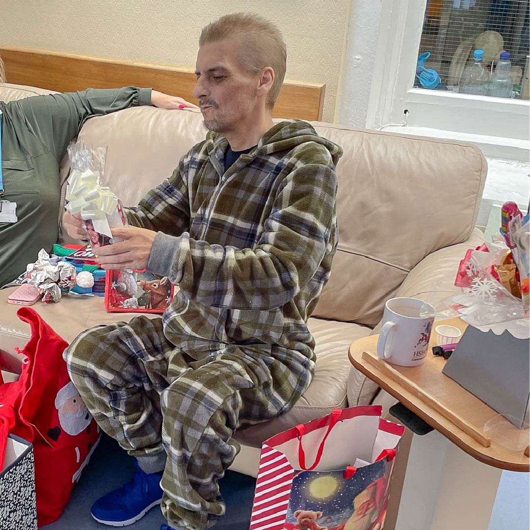 Patient opening Christmas presents