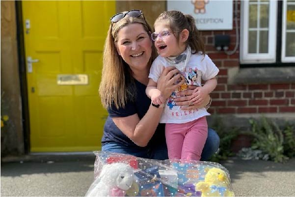 Rachel with her daughter Annabelle in front of Zoe's Place Baby Hospice Middlesbrough