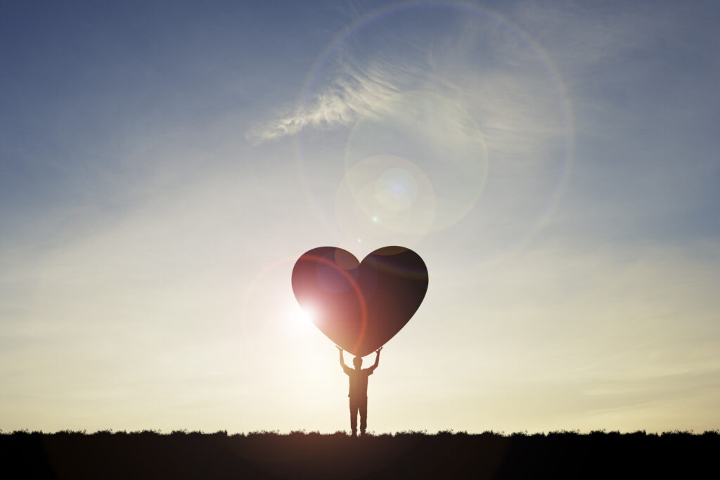 Man holding love heart