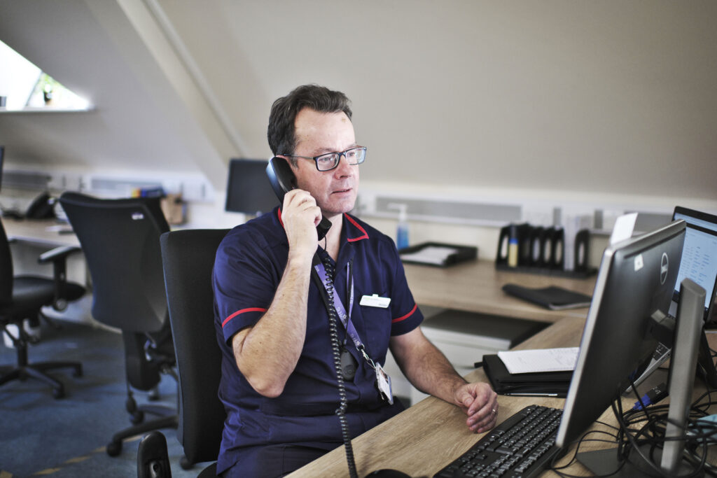 Nurse on the phone to a patient