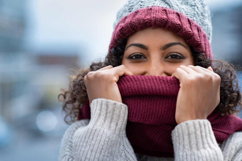 Women wrapped up warm in hat and scarf