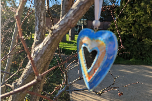 Remembrance heart hanging on a tree in St Helena Hospice gardens