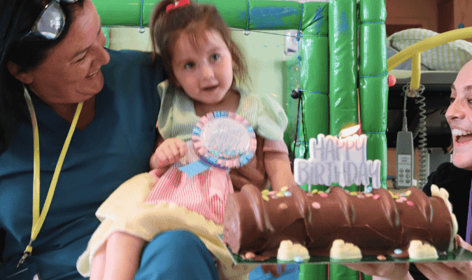 Lottie with birthday cake