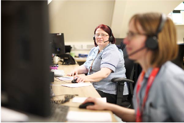 Nurses talking on a support help line